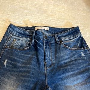 Unpublished ripped blue jeans